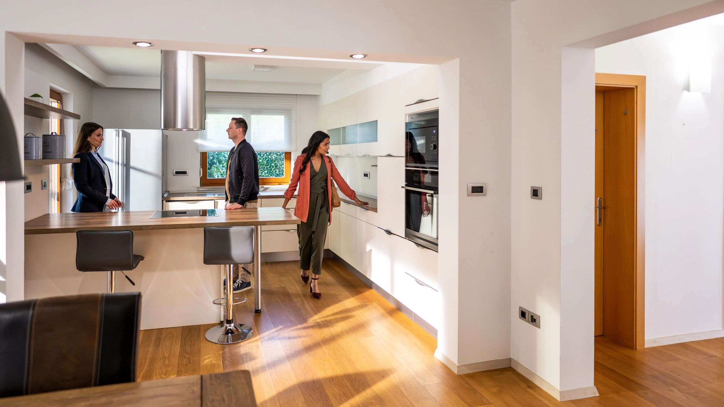 Modern kitchen renovation consultation in a bright home